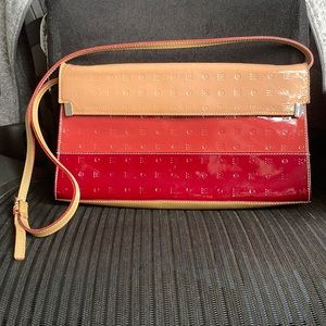 Arcadia Italy pink, red, and tan stripped leather purse
